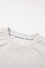 Hazel Blues® |  Rhinestone Pearl Detail Round Neck Puff Sleeve Top