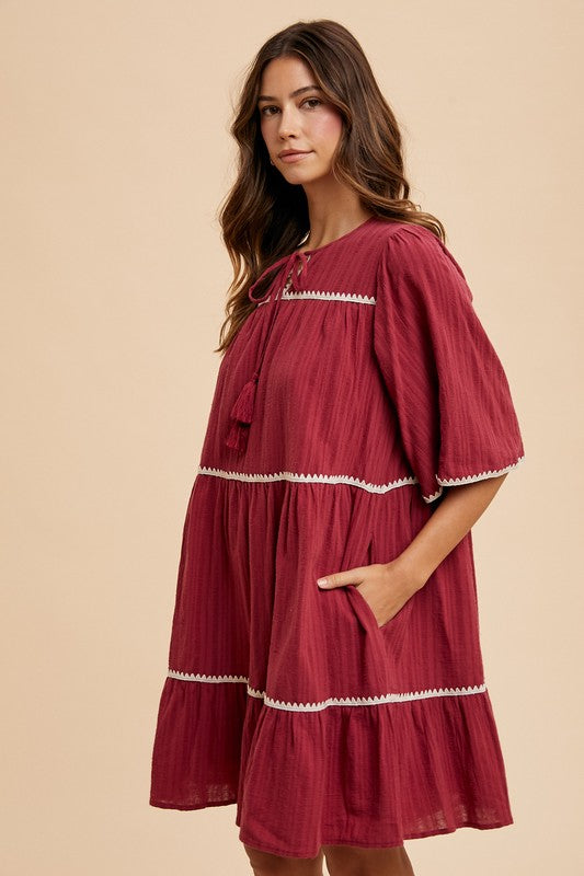 Hazel Blues® |  Annie Wear Tassel Contrast Trim Tie Neck Half Sleeve Tiered Dress