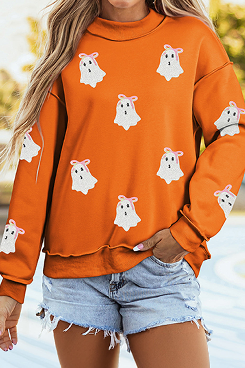 Avery Belle Carrot Sequin Ghost Graphic Exposed Seam Mock Neck Pullover Sweatshirt