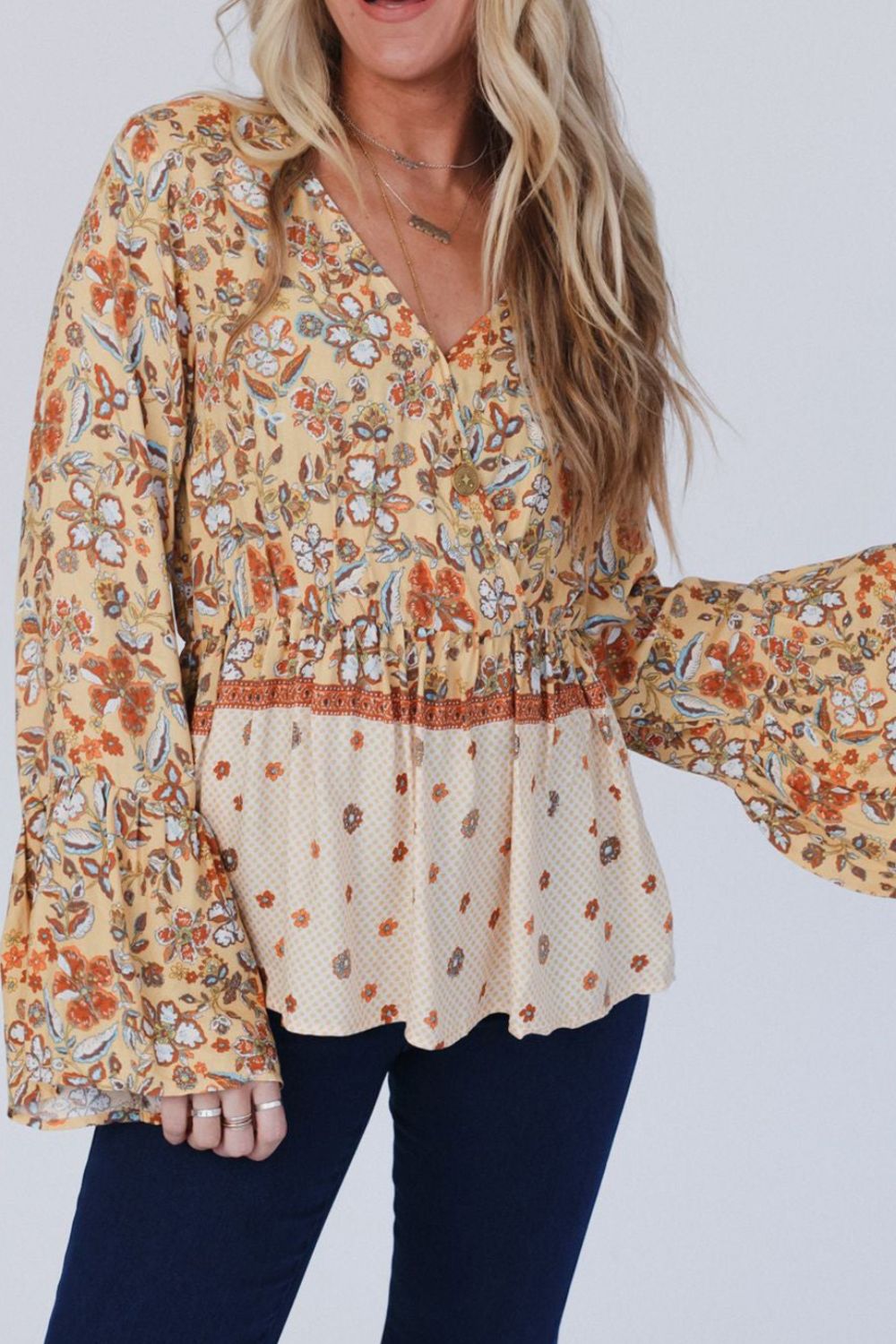 Hazel Blues® |  Peplum Printed Surplice Flare Sleeve Blouse