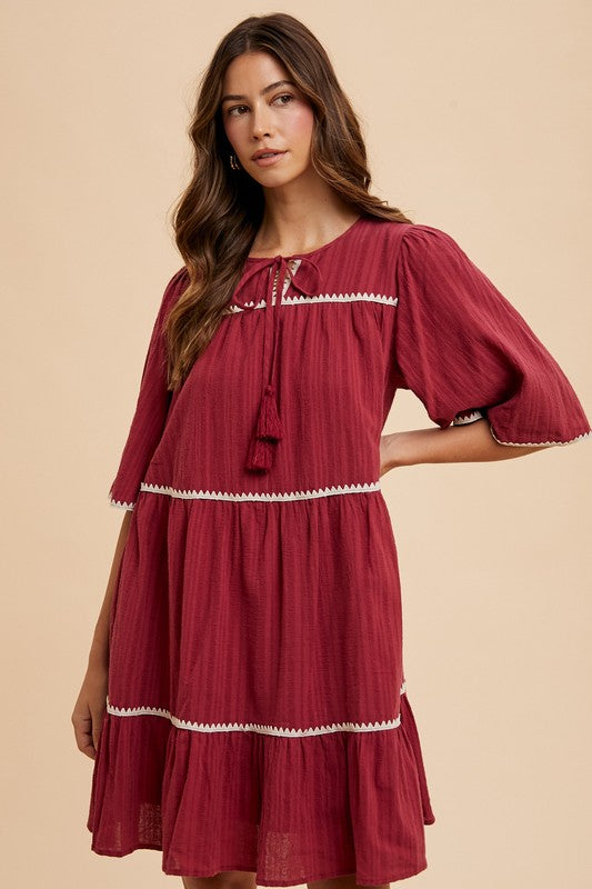 Hazel Blues® |  Annie Wear Tassel Contrast Trim Tie Neck Half Sleeve Tiered Dress