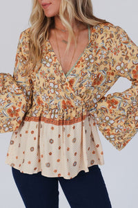 Hazel Blues® |  Peplum Printed Surplice Flare Sleeve Blouse