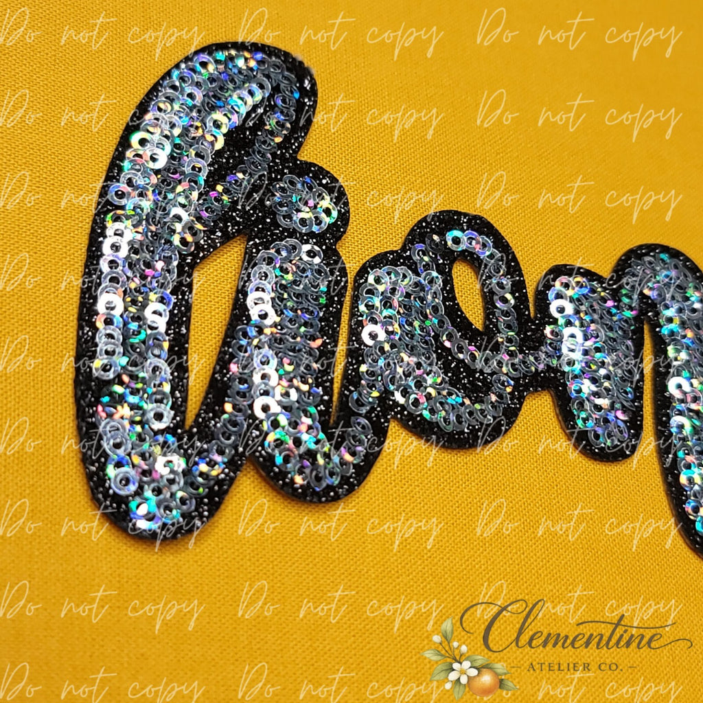 Lions Mascot Sequin Script | Small Iron-On Patch |  Hats, Clothing, Bags+