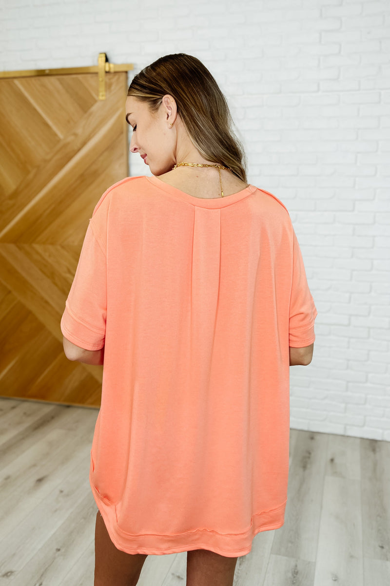 Hazel Blues® |  In the Rotation Exposed Seam Tee in Apricot Splash