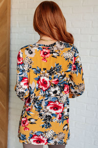 Hazel Blues® |  V-Neck Scoop Hem Top in Marigold Floral