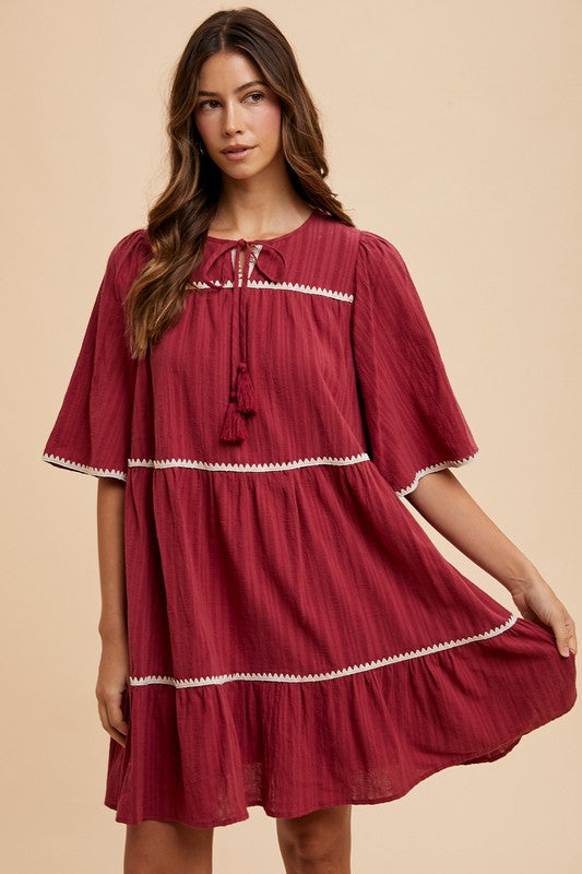 Hazel Blues® |  Annie Wear Tassel Contrast Trim Tie Neck Half Sleeve Tiered Dress