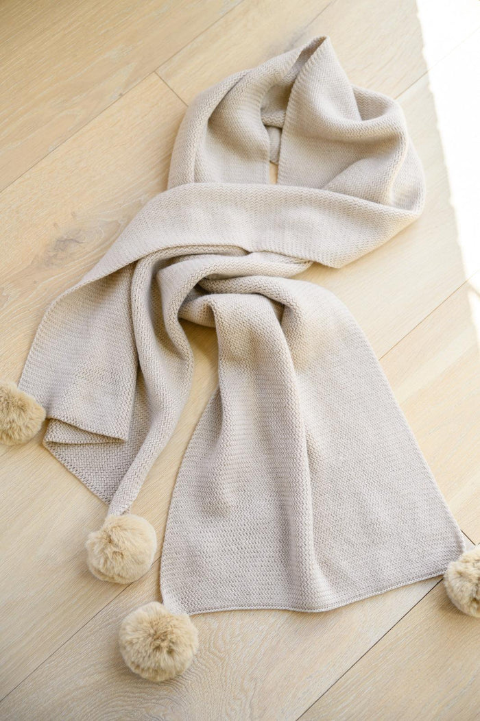 Hazel Blues® | Knitted Fuzzy Pom Pom Scarf In Beige - Hazel Blues®