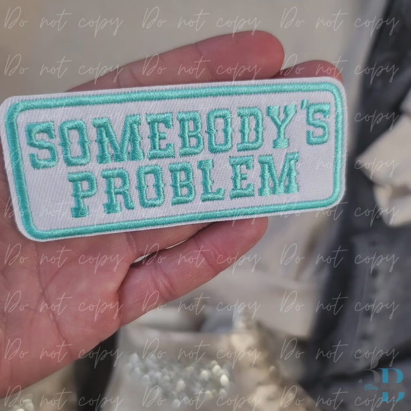 Somebody’s Problem Teal Embroidered Iron-On Patch