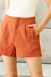 Hazel Blues® |  And The Why Every Little Thing Pleated High Waisted Shorts in Ochre