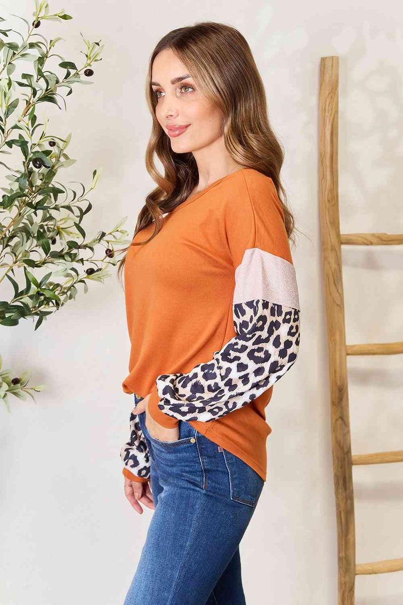 Hazel Blues® |  Double Take Leopard Long Sleeve Round Neck Sweatshirt
